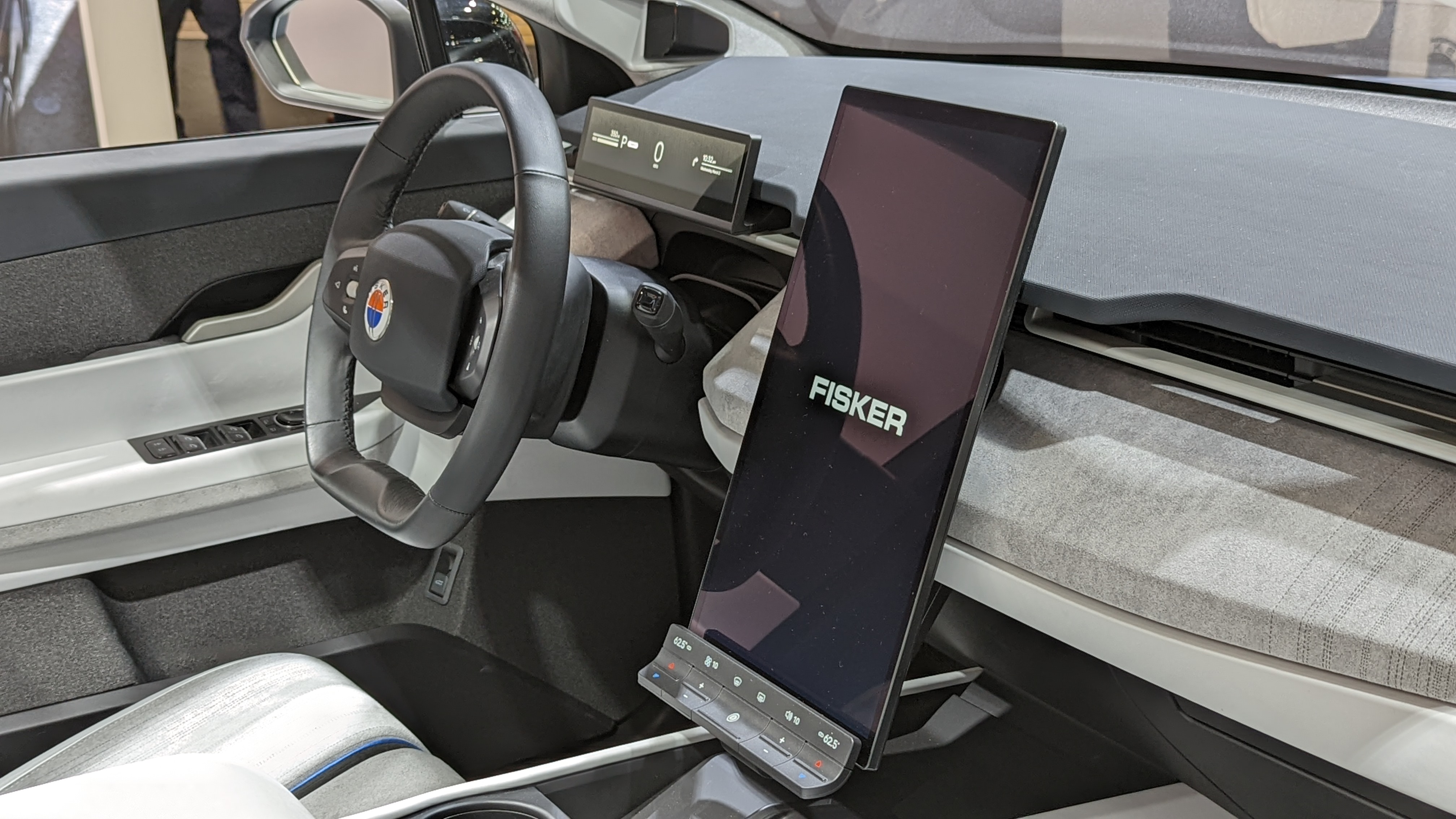Angled view of steering wheel and screen